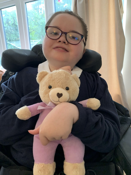 Edie with her TLC bear Image United Grand Lodge of England