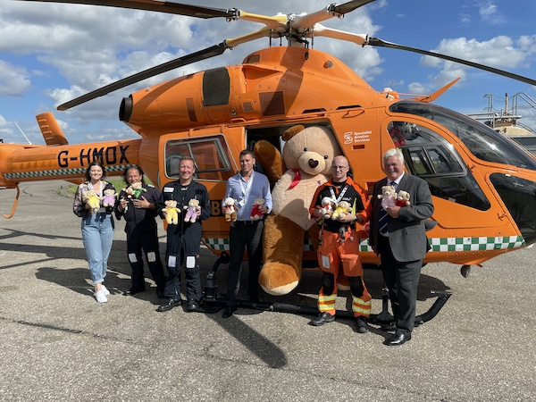 Magpas staff and Tony Henderson with the TLC bears and Big Ted